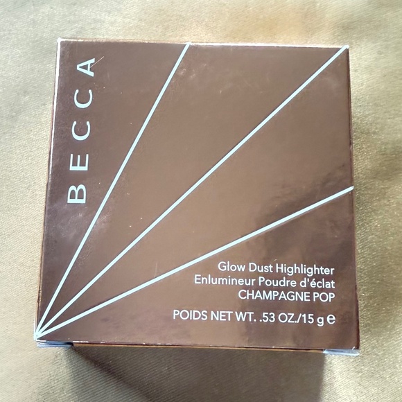 Becca Cosmetics Glow Dust Highlighter in Champagne Pop - Picture 1 of 5